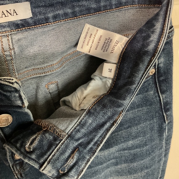 Zenana High Rise Button-Fly Flare Jeans With Distressed Knees - Picture 6 of 6